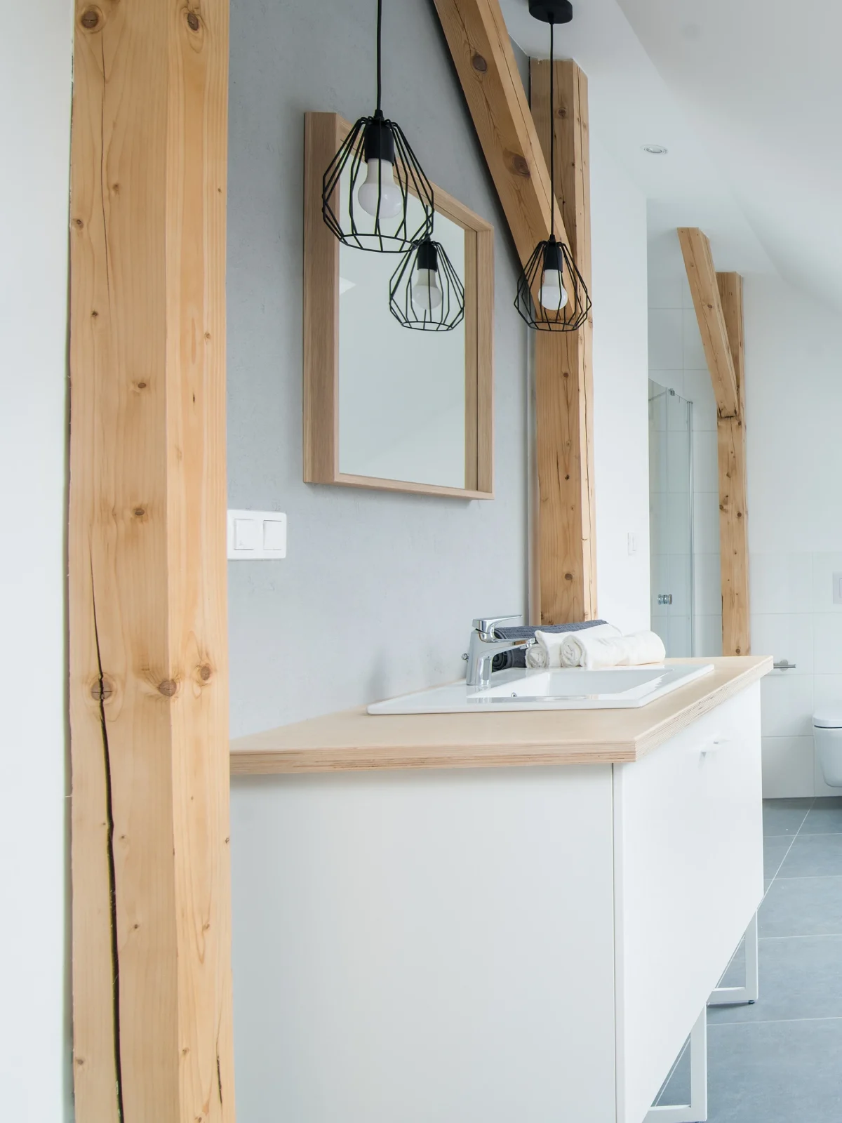 Contemporary loft bathroom design with skylight renovation