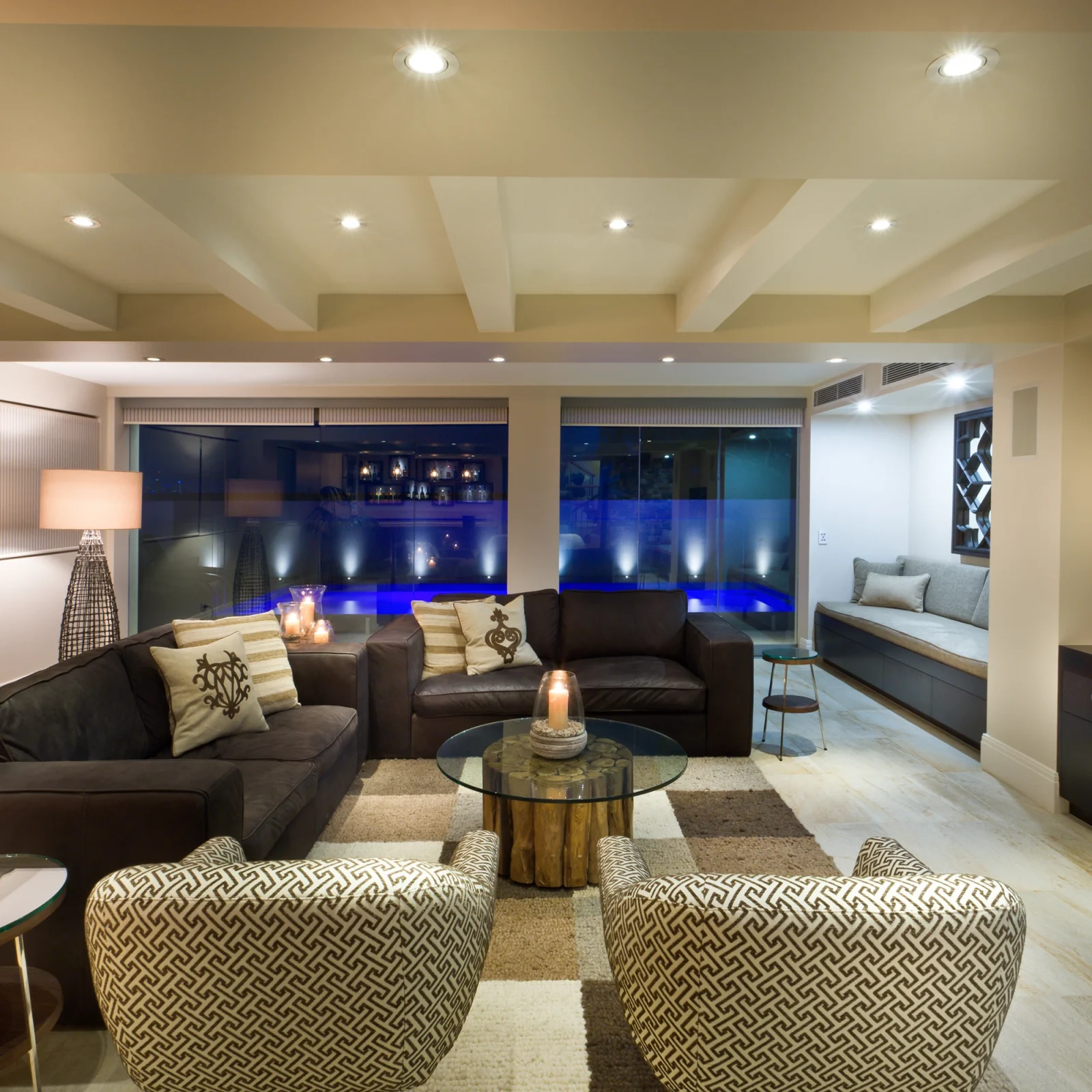 Renavo Build renovated basement living space with cozy seating and lighting