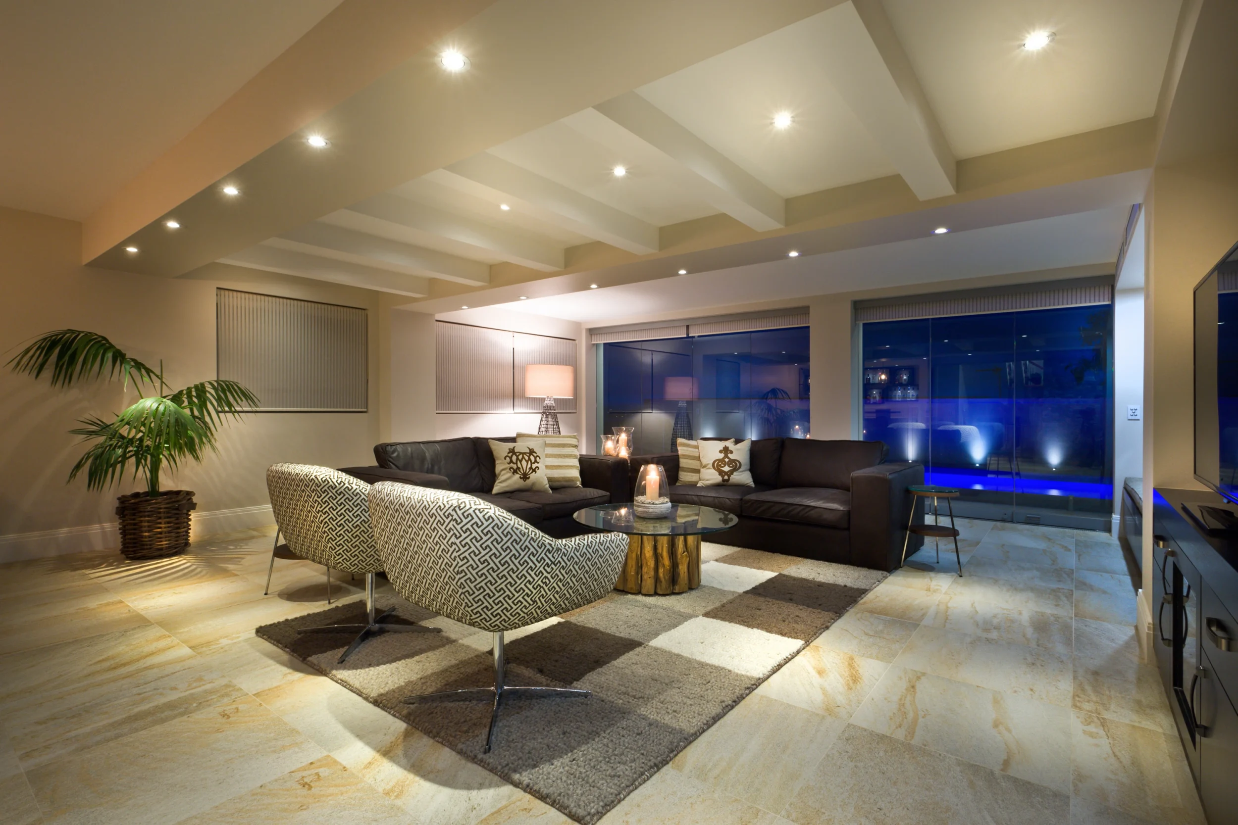 Modern basement living room renovation by Renavo Build