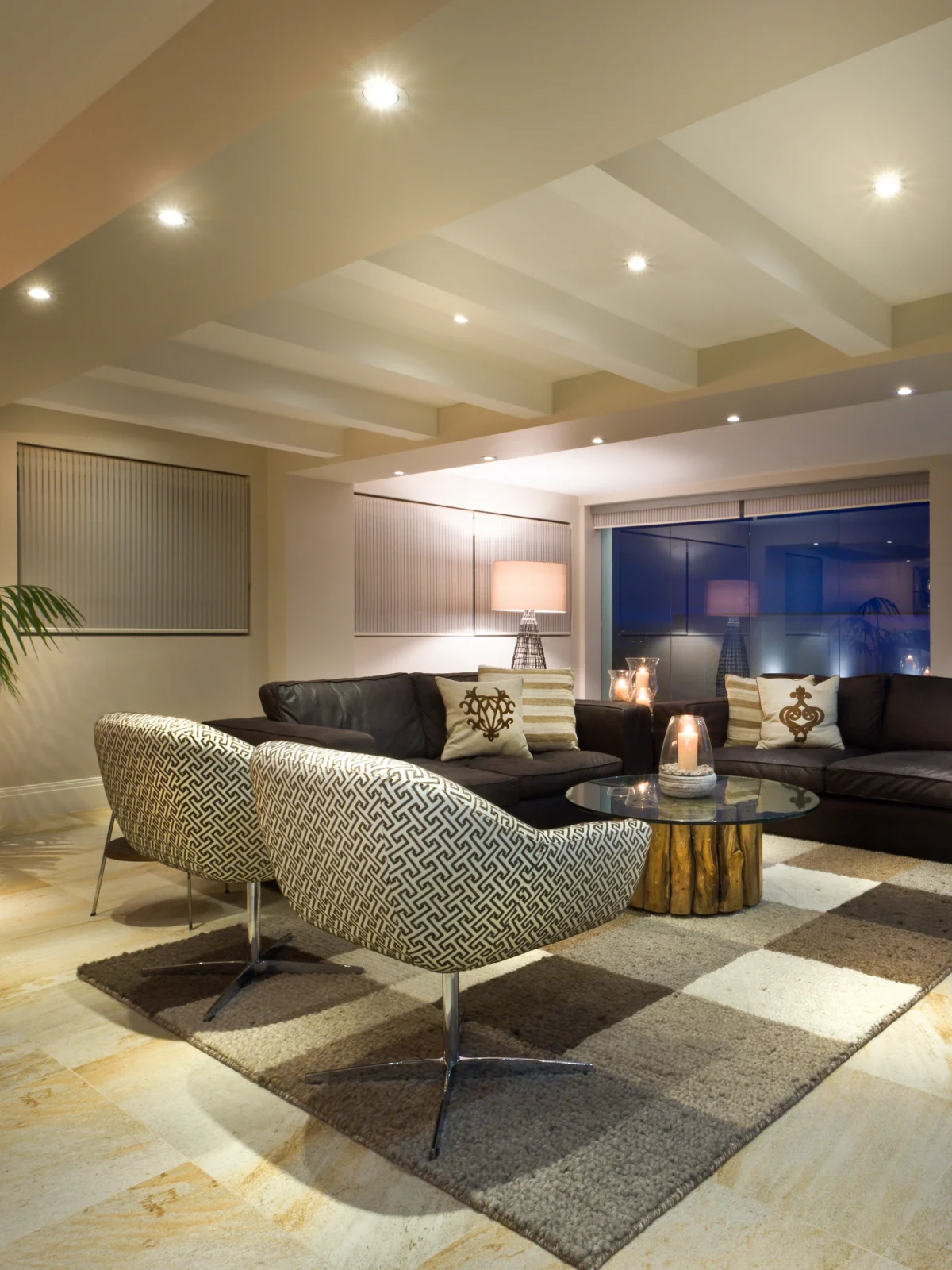 Modern basement living room renovation by Renavo Build