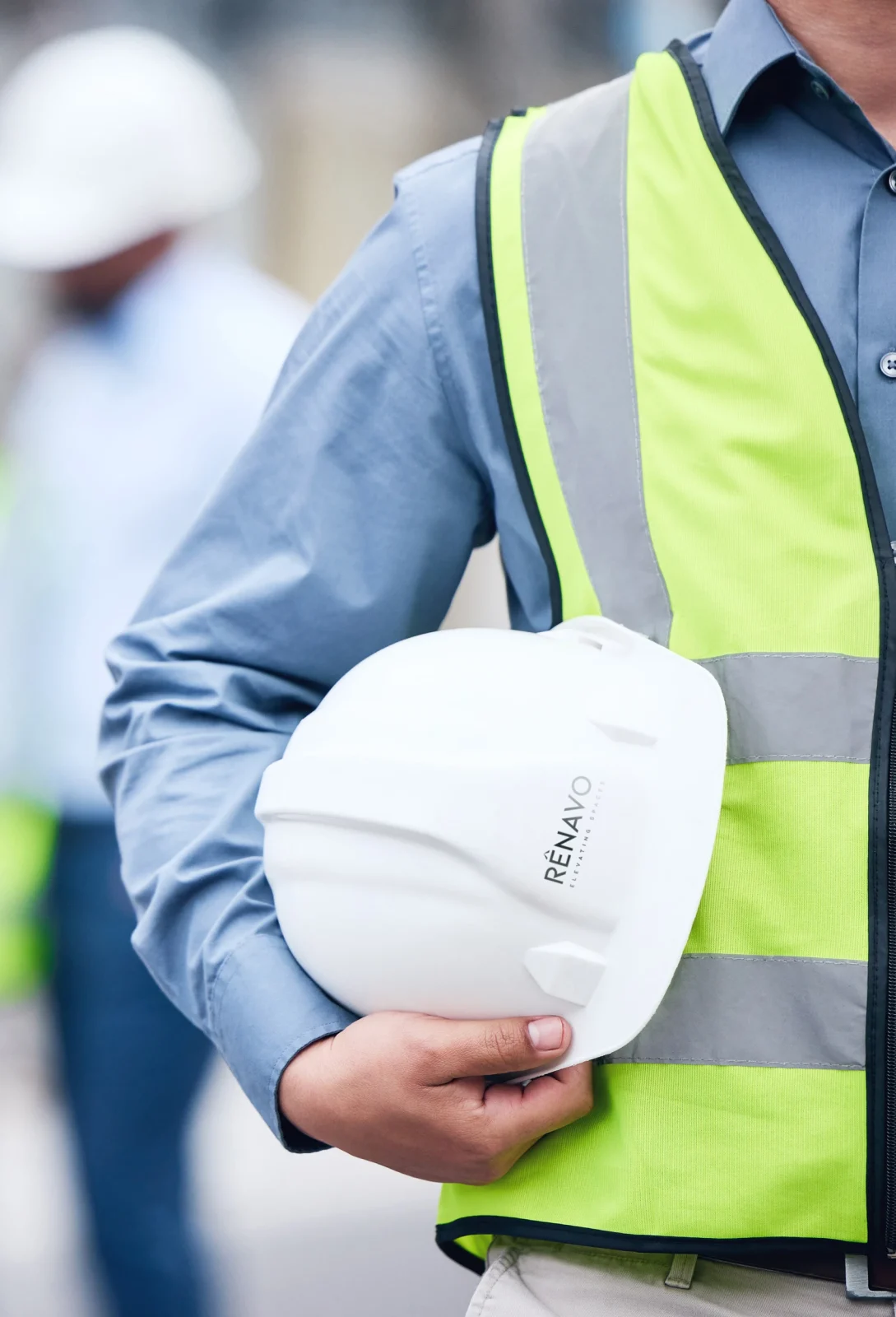 Renavo Build construction team with safety helmets on site